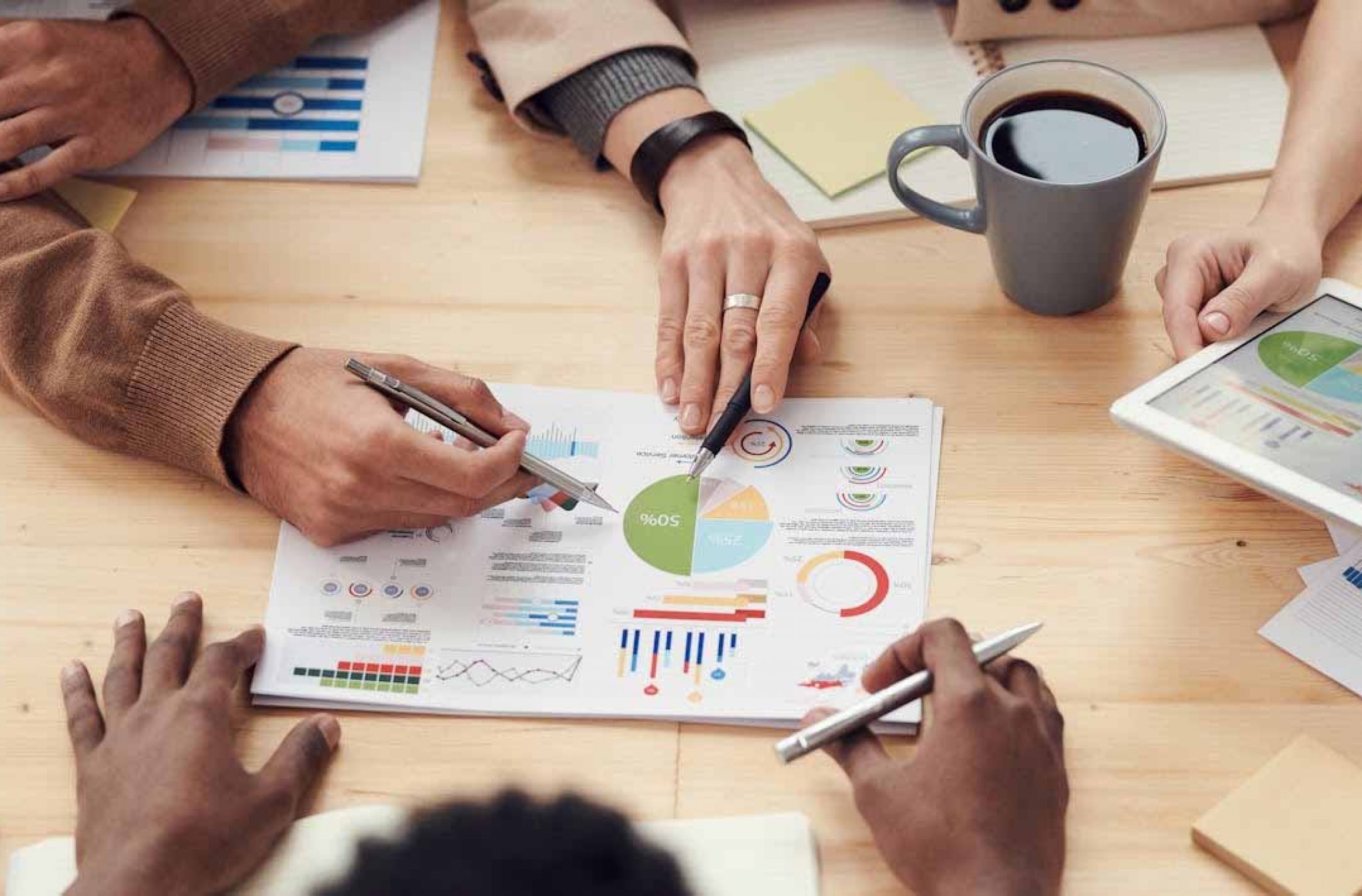 Business-owners-reviewing-financial-charts-and-performance-reports-together-during-a-strategic-accounting-and-business-advisory-meeting-new-blog-image-1